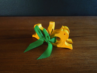 Aarikka lintu keltainen lautasliinarengas 4 kpl