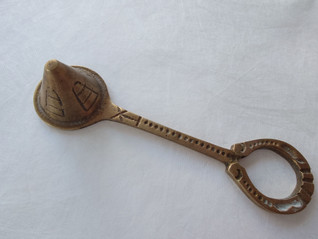 Vanha messinkinen kynttilän sammutin