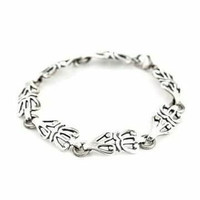 kalevalakoru Hopeinen aurinkoleijona rannekoru