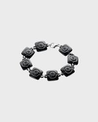 maan voima tummennettu pronssirannekoru