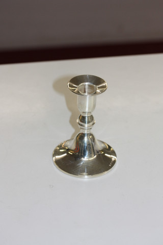 hopeinen kynttilänjalka