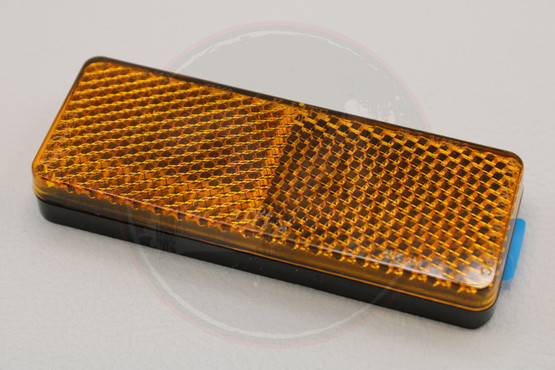 Heijastin oranssi 85 x 31mm tarra kiinnitys (iskunvaimentimeen)