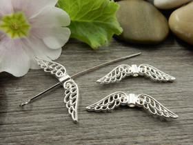 Metallihelmi/riipus siivet , 31x8mm, kirkashopea, 10kpl