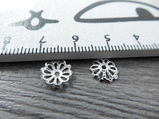 Helmihattu kukka, 8.5mm, kirkashopea, 20kpl