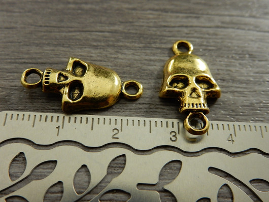 Pääkalloriipus/ linkki, 22x11mm, antiikinkulta 1kpl