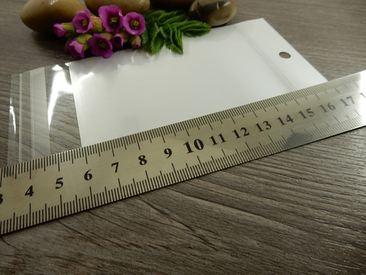 Sellofaanipussi reiällä, 7x14cm, valkoinen, 1kpl