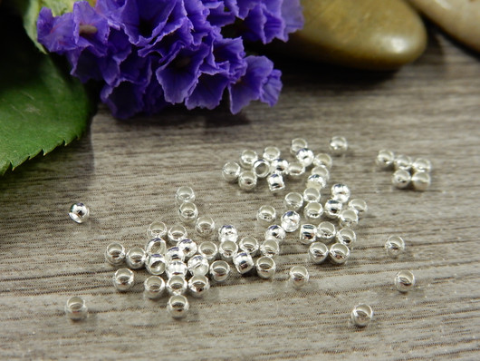 Puristushelmi, 2mm, kirkashopea, 50kpl