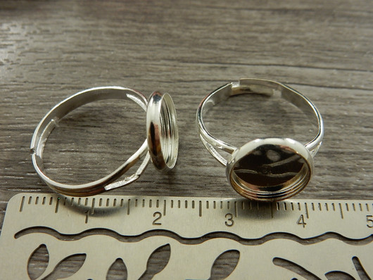 Sormuspohja säädettävä, n.17mm, 10mm kapussille , kirkashopea, 1kpl
