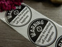 Warning tarra, 38mm, musta-valkoinen, 10kpl