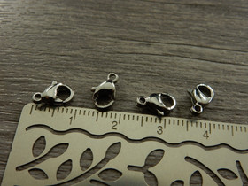 Papukaijalukko, 9x5mm, rst, 1kpl