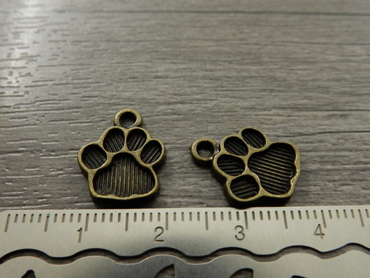 Tassuriipus, 15x12mm, pronssi, 1kpl