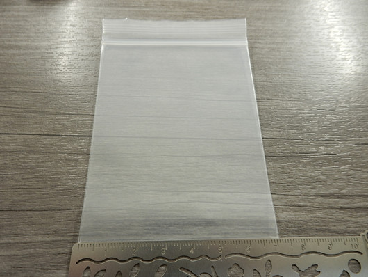 Salpapussi, 7x10mm, kirkas/valkoinen, 1kpl