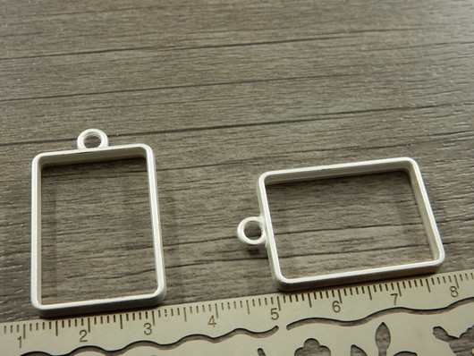 Riipus/korukehys suorakulmio, 34x21mm, kirkashopea, 1kpl