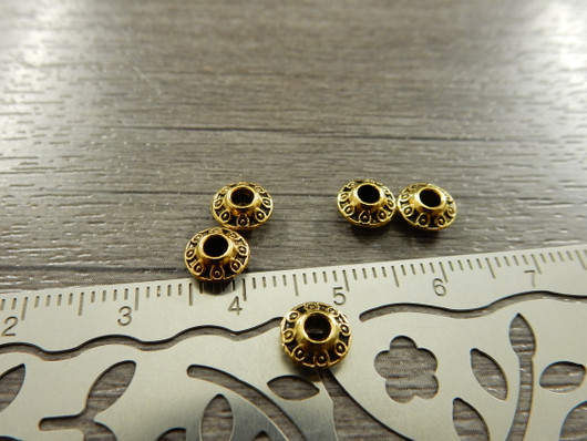 Metallihelmi bicone, 6.5x3.5mm, antiikinkulta, 20kpl