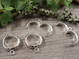 Korvakorurengas huggie lenkillä, 16x4mm, kirkashopea/rst, 1pari