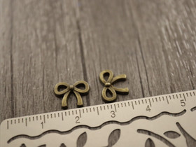 Rusettiriipus, 11x8mm, pronssi, 1kpl