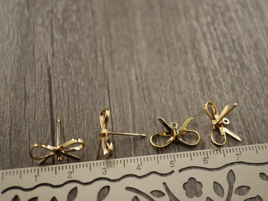 Korvakorutappi lenkillä rusetti, 16x18mm, 18K/kulta, 1pari