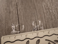Korvakorutappi reiättömään korvaan, 12x10mm, kirkas, 10paria