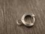 Korvakorurengas lenkillä, 11x2mm, kirkashopea/rst, 1pari