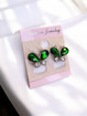 Perhoskorvakorut vihreä nappikorvakorut