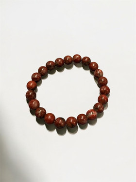 Kivirannekoru punaruskea