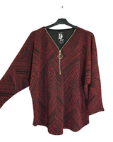 Kimallepusero V-pääntiellä ja vetoketjulla. Tunikamallinen.One size