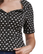  Musta vintage tyylinen Polka dot pusero leveillä kauluksilla.