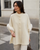Premium Knit Cape – Elegantti neuleviitta tekoturkiskoristeilla