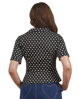  Musta vintage tyylinen Polka dot pusero leveillä kauluksilla.