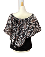 Ruskea/musta, liehukepusero. Ohut kultalanka koristeena.