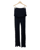 Joustavat  trumpettilahkeiset pitsihousut. One size