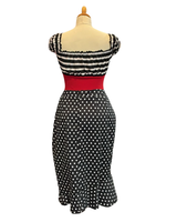 Musta kapea kynähame.  Polka dot 50s tyylinen röyhelöhame.