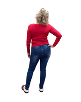 Pitkähihainen pusero, jossa on V-pääntie ja edessä säädettävät nyörit.