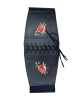 Korsettimainen leveä nyöritetty patellavyö kukkabrodeerauksella