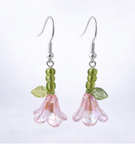 Vaaleanpunaiset kukka korvakorut