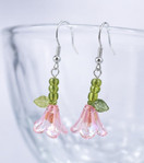 Vaaleanpunaiset kukka korvakorut