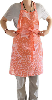 Oranssi kukka esiliina