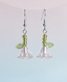 Vaaleanpunaiset kukka korvakorut