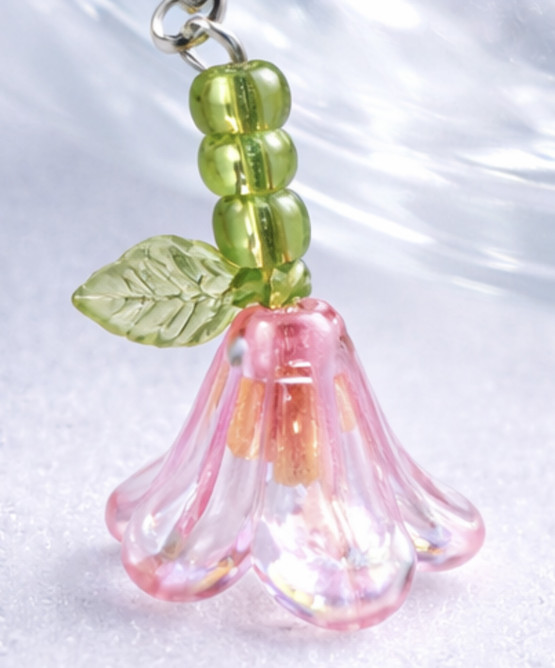 Vaaleanpunaiset kukka korvakorut