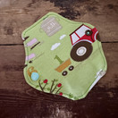 Yhdessä, parempi mieli, vihreäpohjainen kestopikkuhousunsuoja