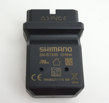 Shimano SM-BTE60 adapteri akun ja laturin väliin