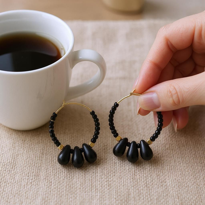 Black trop korvakorut kirurginteräs