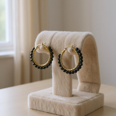 Korvakorut kirurginteräs musta kristalli