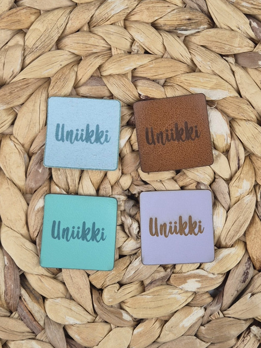 OMPELUMERKKI: UNIIKKI