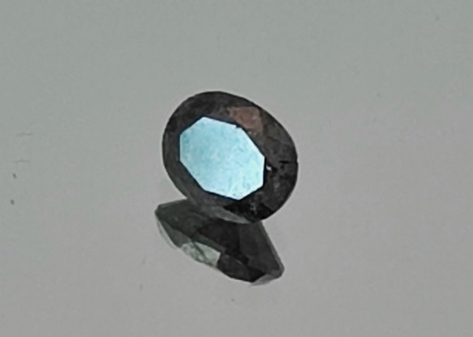 0.7 Carat Diamond, rare oval fancy brown - dark grey - black