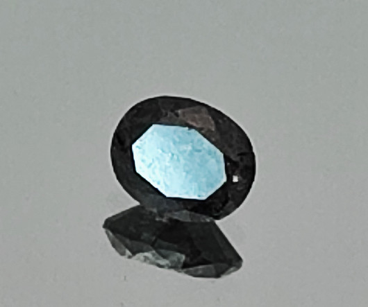 0.7 Carat Diamond, rare oval fancy brown - dark grey - black