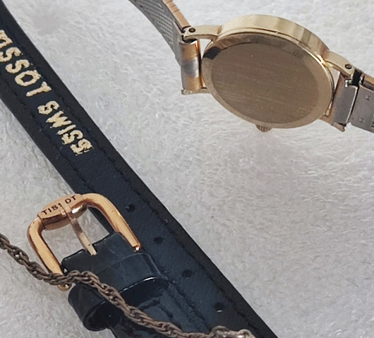 14ct golden Tissot 