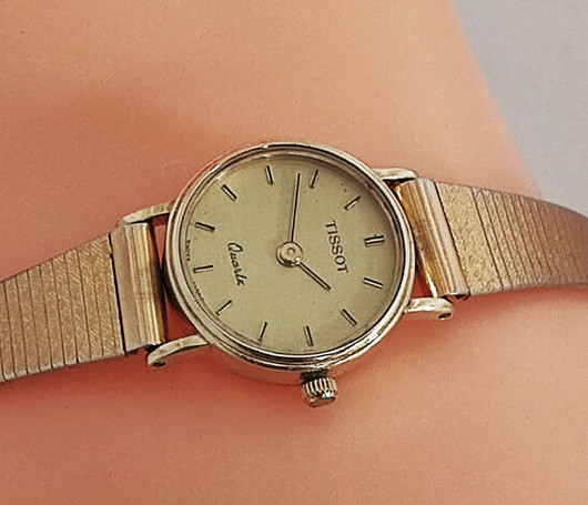 14ct golden Tissot 