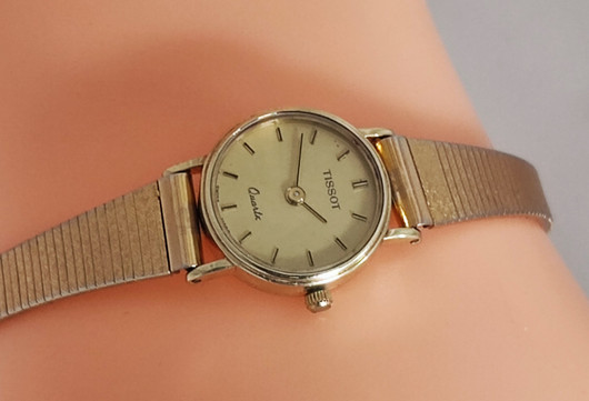 14ct golden Tissot 