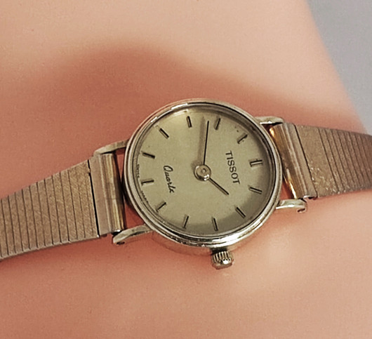 14ct golden Tissot 